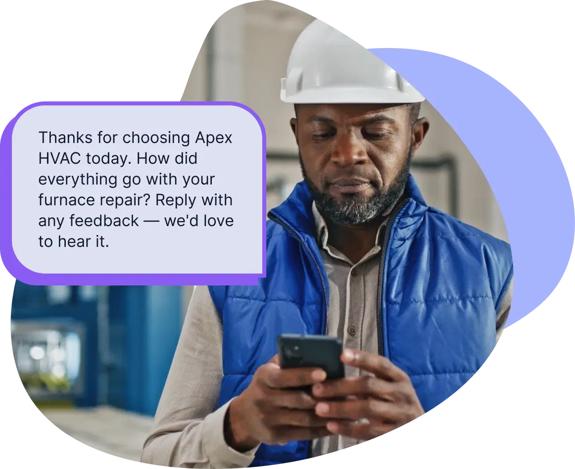 A customer reading a follow-up text from an HVAC company